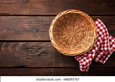 Empty Wicker Basket On A Wooden Background, Top View