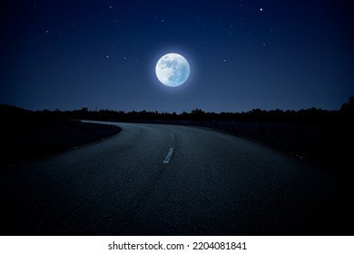 Empty Winding Road In Blue Night. Night Landscape With Highway, Moon And Stars