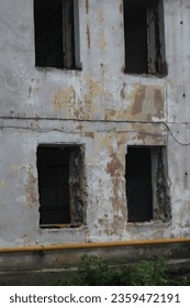 Empty windows in abandoned building