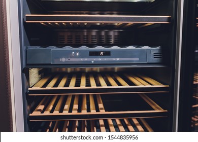 Empty Wine Fridge In A Kitchen Home Rack.