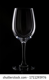 Empty Wine Glass On Black Background With Beautiful Highlights