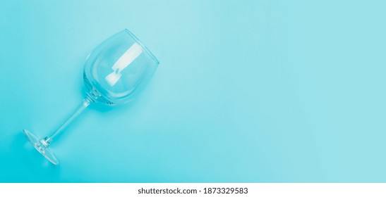 Empty Wine Glass On Clean Minimal Colored Background.