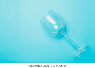 Empty Wine Glass On Clean Minimal Colored Background.