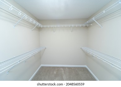 Empty Wire Shelving Storage In An Empty Closet.