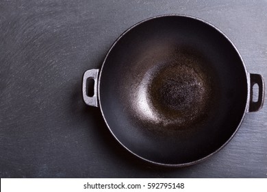 Empty Wok In A Dark Background, Top View