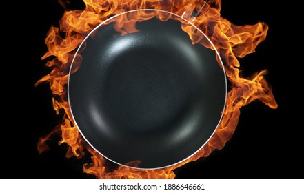 Empty Wok Pan, Flames On Background. High Angle View Of Meal Preparation, Studio Shot.