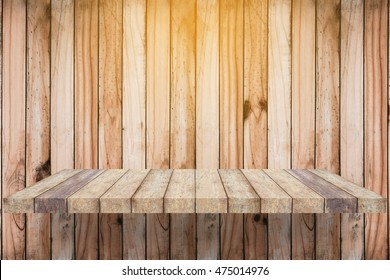 Empty Wood Shelf On Wood Wall