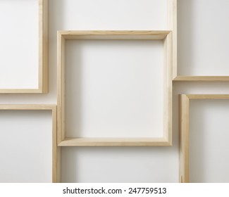 Empty Wood Shelf On White Wall