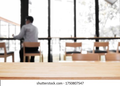 Empty Wood Table Cafe With Blured Background.