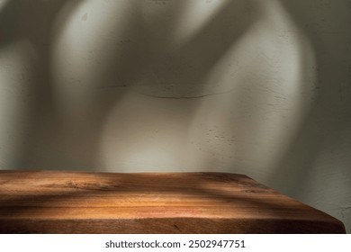 Empty wood table corner on stucco wall background. Mock up for presentation, branding products, cosmetics food or jewelry.