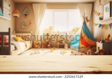 Empty wood table over blur background of childrens room with kid toys. Product display presentation.