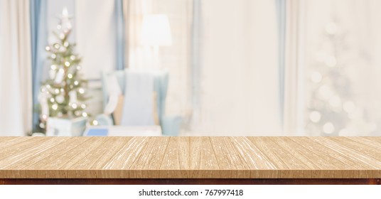 Empty Wood Table Top With Abstract Warm Living Room Decor With Christmas Tree Blur Background With Bokeh Light,Holiday Backdrop,Mock Up Banner For Display Of Advertise Product ,luxury House