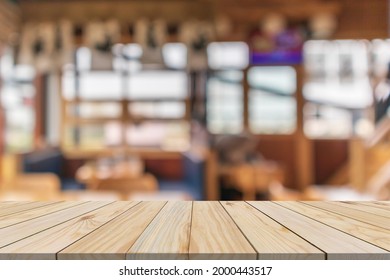 Empty wood table top with blurred Japanese restaurant background