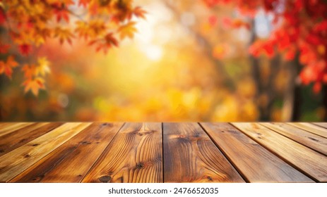 Empty wood table top and blurred autumn tree and red leaf background - can used for display or montage your products - Powered by Shutterstock