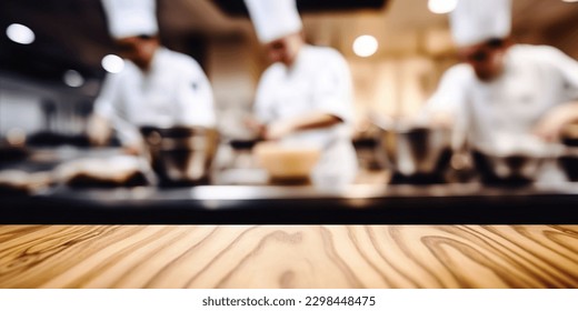 Empty Wood table top with Chef cooking in restaurant kitchen blurred defocused background - Powered by Shutterstock