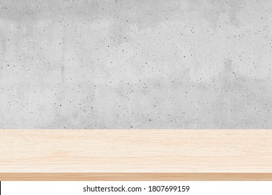 Empty wood table top on gray concrete wall background, Used for display or montage your products