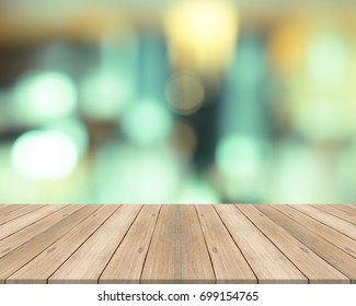 Empty wood table top on blurred background,for montage your products - Shutterstock ID 699154765