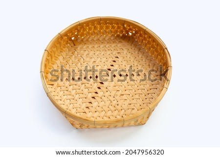 Empty wooden bamboo basket on white background.