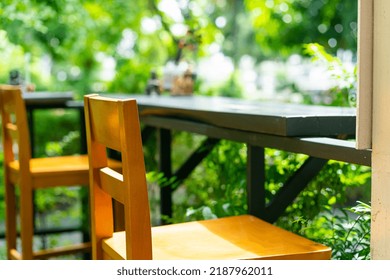 Empty Wooden Bar Stool Decoration In Garden