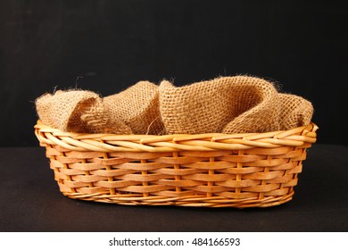 Empty Wooden Basket With Gunny Sack