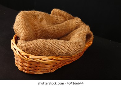 Empty Wooden Basket With Gunny Sack