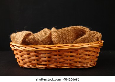 Empty Wooden Basket With Gunny Sack