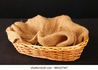 Empty Wooden Basket With Gunny Sack