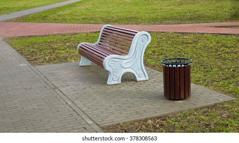 Empty Wooden Bench In The City Park