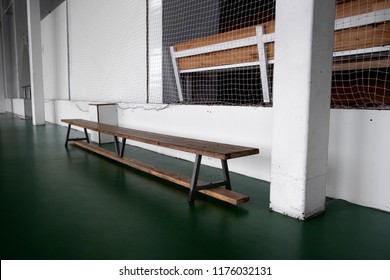 Empty Wooden Benche In School. Tribune In The Gym For Fans Of Matches With Empty Wooden Seats. Lifestyle, Game And Power Concept.