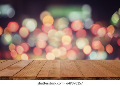 empty wooden board table in front of blurred background. Perspective brown wood over blur in coffee shop - can be used for display or montage your products. - Shutterstock ID 649878157