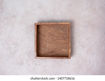 Empty Wooden Box On Concrete Background. View From Above. Copy Space