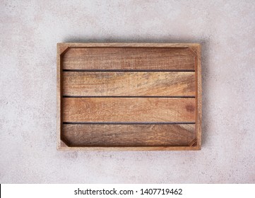 Empty Wooden Box On Concrete Background. View From Above. Copy Space