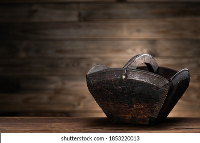 An Empty Wooden Bucket On The Table