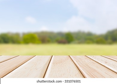Empty Wooden deck table over beautiful nature background - Shutterstock ID 331076501