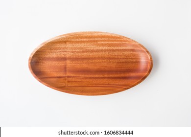 Empty wooden dish isolated on white background with clipping path. Top view