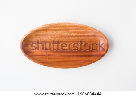 Empty wooden dish isolated on white background with clipping path. Top view