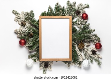 Empty Wooden Frame For Christmas And New Year Menu Form Or Invitation With Fir Branches And Decoration. Flat Lay Winter Holidays Concept. Top View. Mockup