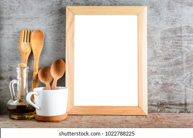 Empty Wooden Frame With Isolated White Background In Kitchen Interior. Layout For Design