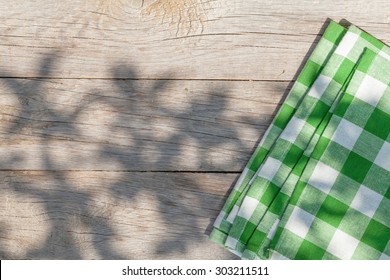 Empty Wooden Garden Table With Tablecloth. Top View With Copy Space