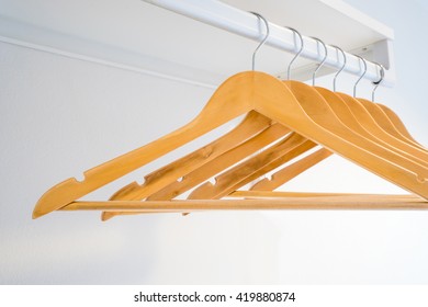 Empty Wooden Hangers On White Background Stock Photo 419880874 ...