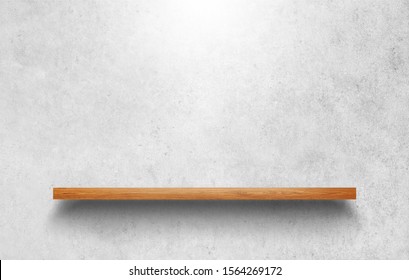Empty wooden shelf over on bare concrete wall background - Shutterstock ID 1564269172