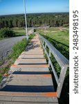 empty wooden stairs outdoors in Köykkyri exercise center in Kempele, Finland