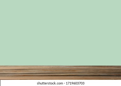 Empty wooden surface on mint background. Mockup for design - Shutterstock ID 1719603703