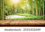 empty wooden table with bamboo garden background