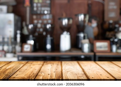 Empty Wooden Table With Blurred Background Of Cafe Or Coffeeshop.
