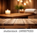 Empty wooden table with blurred effect bokeh spa interior as background