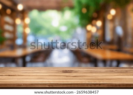 Empty wooden table  bokeh light background. Tables and chairs in the lobby of restaurant. Visitors to restaurant for dinner. Cozy bokeh lightening. Beautiful bright interior. Blurred bokeh basic