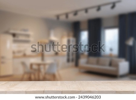 Empty wooden table in dining room. Space for design