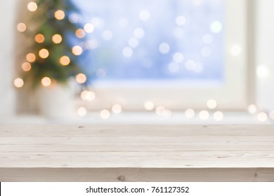 Empty Wooden Table In Front Of Blurred Winter Holiday Background