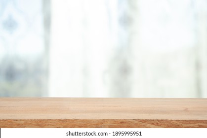 empty wooden table on background of abstract blur white interior, montage, product display, inside and window.
 - Shutterstock ID 1895995951